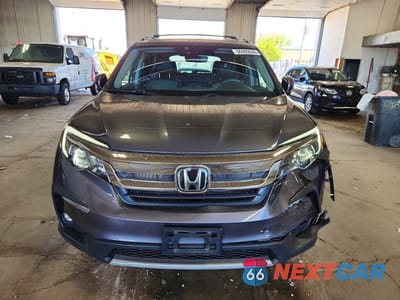 Piąte zdjęcie samochodu w środku: 2020 HONDA PILOT EXL VIN:5FNYF6H58LB049697 - miniatura