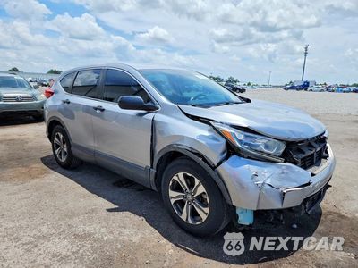 Czwarte zdjęcie samochodu z boku: 2018 HONDA CR-V LX VIN:2HKRW5H39JH412312 - miniatura