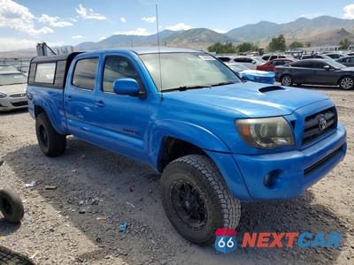 Czwarte zdjęcie samochodu z boku: 2005 TOYOTA TACOMA DOUBLE CAB LONG BED VIN:5TEMU52N05Z092570 - miniatura