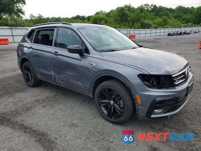 Czwarte zdjęcie samochodu z boku: 2019 VOLKSWAGEN TIGUAN SE VIN:3VV2B7AX9KM186064 - miniatura