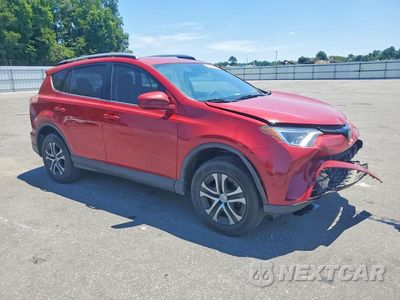 Czwarte zdjęcie samochodu z boku: 2017 TOYOTA RAV4 LE VIN:JTMZFREV0HJ121163 - miniatura