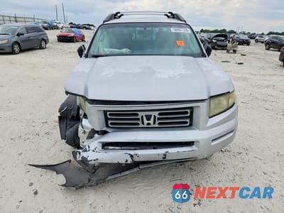 Piąte zdjęcie samochodu w środku: 2006 HONDA RIDGELINE RT VIN:2HJYK16286H571165 - miniatura