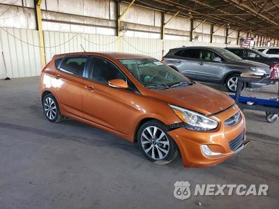 Czwarte zdjęcie samochodu z boku: 2015 HYUNDAI ACCENT SPORT VIN:KMHCU5AE5FU217680 - miniatura