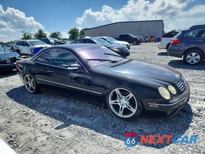 Czwarte zdjęcie samochodu z boku: 2003 MERCEDES-BENZ CL 500 VIN:WDBPJ75J03A033910 - miniatura