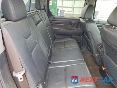 Zdjęcie 10 z 12 samochodu: 2010 HONDA RIDGELINE RTL VIN:5FPYK1F51AB004820 - miniatura