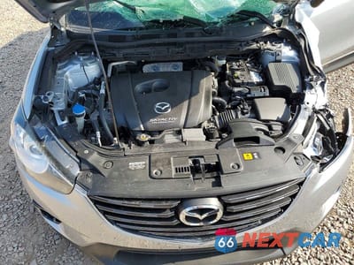 Zdjęcie 10 z 11 samochodu: 2016 MAZDA CX-5 TOURING VIN:JM3KE4CY6G0798153 - miniatura