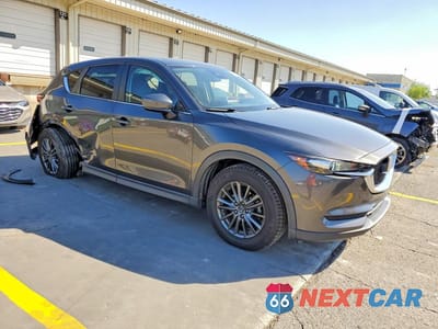 Czwarte zdjęcie samochodu z boku: 2019 MAZDA CX-5 TOURING VIN:JM3KFBCMXK1530031 - miniatura