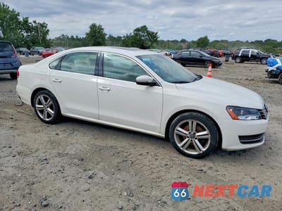 Czwarte zdjęcie samochodu z boku: 2014 VOLKSWAGEN PASSAT SE VIN:1VWBH7A32EC015878 - miniatura