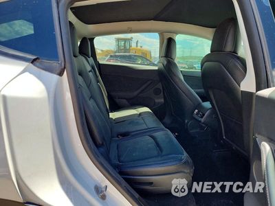 Zdjęcie 10 z 12 samochodu: 2022 TESLA MODEL Y VIN:7SAYGAEE2NF313510 - miniatura