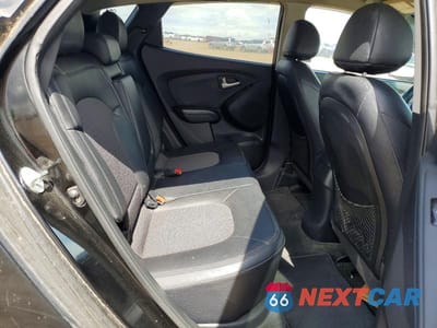 Zdjęcie 11 z 13 samochodu: 2012 HYUNDAI TUCSON GLS VIN:KM8JUCAC5CU497039 - miniatura