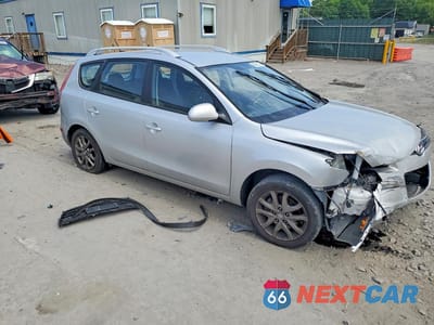 Czwarte zdjęcie samochodu z boku: 2012 HYUNDAI ELANTRA TOURING GLS VIN:KMHDC8AEXCU155794 - miniatura
