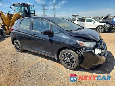 Czwarte zdjęcie samochodu z boku: 2016 HONDA FIT LX VIN:JHMGK5H59GX011343 - miniatura