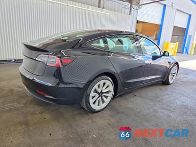 Trzecie zdjęcie samochodu z tyłu: 2023 TESLA MODEL 3 VIN:5YJ3E1EA7PF437897 - miniatura