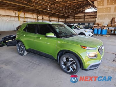 Czwarte zdjęcie samochodu z boku: 2022 HYUNDAI VENUE SEL VIN:KMHRC8A3XNU178502 - miniatura