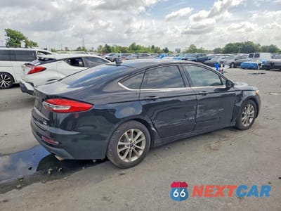 Trzecie zdjęcie samochodu z tyłu: 2019 FORD FUSION SE VIN:3FA6P0HD0KR280864 - miniatura