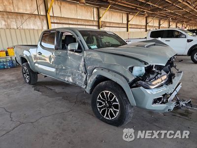 Czwarte zdjęcie samochodu z boku: 2023 TOYOTA TACOMA TRD SPORT VIN:3TMDZ5BN8PM142214 - miniatura