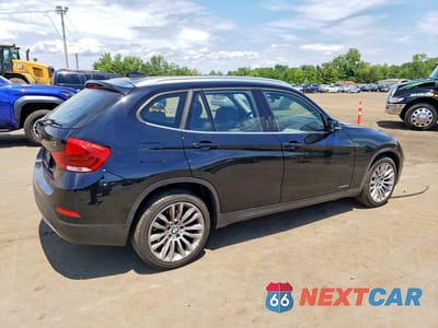 Trzecie zdjęcie samochodu z tyłu: 2014 BMW X1 XDRIVE28I VIN:WBAVL1C56EVR93781 - miniatura