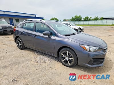 Czwarte zdjęcie samochodu z boku: 2020 SUBARU IMPREZA PREMIUM VIN:4S3GTAD69L3710575 - miniatura