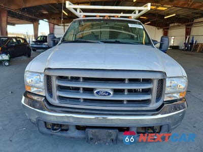 Piąte zdjęcie samochodu w środku: 2004 FORD F350 SRW SUPER DUTY VIN:1FDSX34L34EA18037 - miniatura