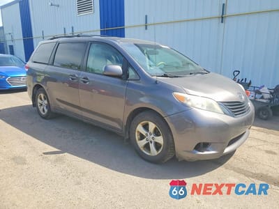 Czwarte zdjęcie samochodu z boku: 2011 TOYOTA SIENNA LE VIN:5TDKK3DC6BS049406 - miniatura