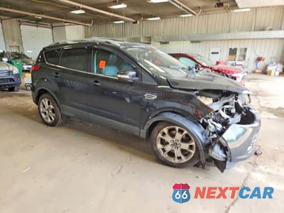 Czwarte zdjęcie samochodu z boku: 2014 FORD ESCAPE TITANIUM VIN:1FMCU9J98EUA62664 - miniatura