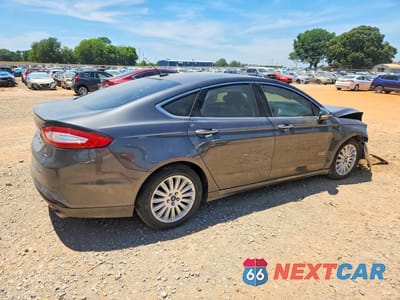 Trzecie zdjęcie samochodu z tyłu: 2015 FORD FUSION SE PHEV VIN:3FA6P0PU3FR307613 - miniatura