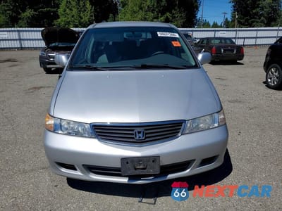 Piąte zdjęcie samochodu w środku: 2001 HONDA ODYSSEY EX VIN:2HKRL186X1H520143 - miniatura