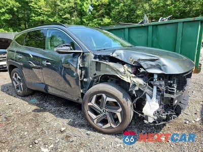 Czwarte zdjęcie samochodu z boku: 2023 HYUNDAI TUCSON LIMITED VIN:5NMJECAEXPH210245 - miniatura