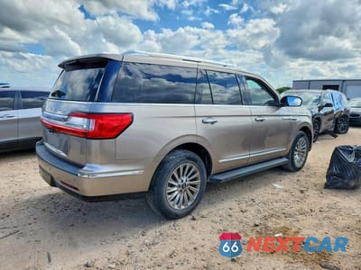 Trzecie zdjęcie samochodu z tyłu: 2018 LINCOLN NAVIGATOR PREMIERE VIN:5LMJJ2MT0JEL00281 - miniatura