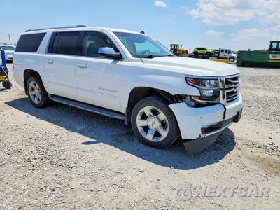 Czwarte zdjęcie samochodu z boku: 2015 CHEVROLET SUBURBAN K1500 LTZ VIN:1GNSKKKCXFR156189 - miniatura