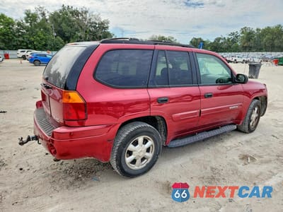Trzecie zdjęcie samochodu z tyłu: 2004 GMC ENVOY VIN:1GKDT13S542253468 - miniatura