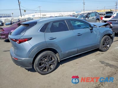 Trzecie zdjęcie samochodu z tyłu: 2022 MAZDA CX-30 PREFERRED VIN:3MVDMBCL4NM446873 - miniatura