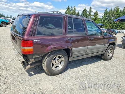 Trzecie zdjęcie samochodu z tyłu: 1997 JEEP GRAND CHEROKEE LAREDO VIN:1J4GZ58Y7VC758297 - miniatura