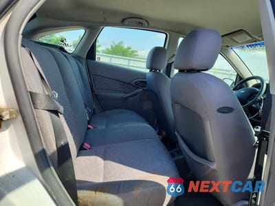 Zdjęcie 10 z 12 samochodu: 2003 FORD FOCUS ZX5 VIN:3FAHP37323R133658 - miniatura