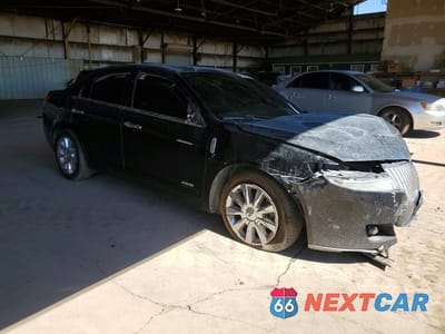 Czwarte zdjęcie samochodu z boku: 2012 LINCOLN MKZ HYBRID VIN:3LNDL2L36CR806662 - miniatura