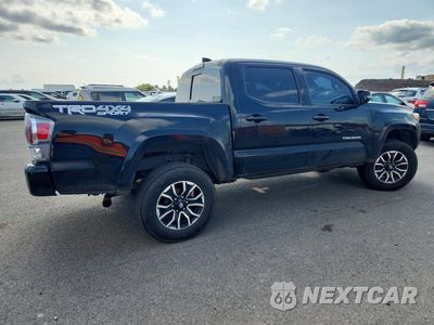 Trzecie zdjęcie samochodu z tyłu: 2023 TOYOTA TACOMA SR V6 VIN:3TYCZ5AN7PT166215 - miniatura