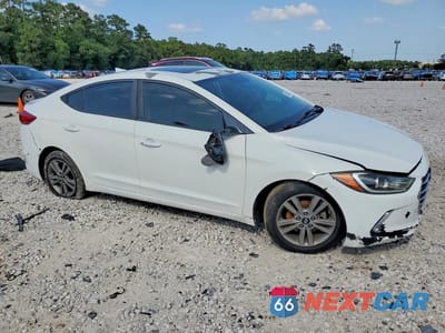 Czwarte zdjęcie samochodu z boku: 2018 HYUNDAI ELANTRA VALUE EDITION VIN:5NPD84LF2JH273723 - miniatura