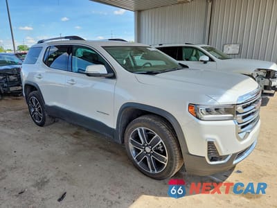Czwarte zdjęcie samochodu z boku: 2023 GMC ACADIA SLT VIN:1GKKNULS0PZ170478 - miniatura
