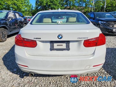 Zdjęcie 6 z 12 samochodu: 2014 BMW 320 I XDRIVE VIN:WBA3C3G50ENS68111 - miniatura