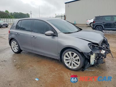 Czwarte zdjęcie samochodu z boku: 2014 VOLKSWAGEN GOLF VIN:WVWDM7AJ4EW005177 - miniatura