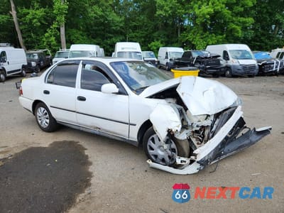 Czwarte zdjęcie samochodu z boku: 1997 TOYOTA COROLLA BASE VIN:2T1BA02E8VC183661 - miniatura