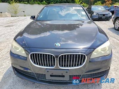 Piąte zdjęcie samochodu w środku: 2014 BMW 750 LXI VIN:WBAYF8C56ED652965 - miniatura