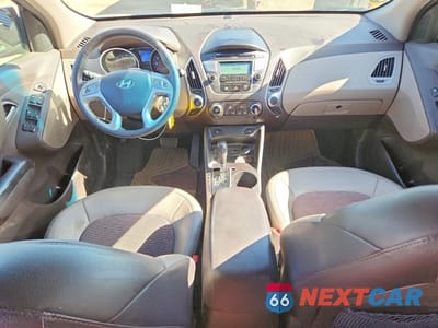 Zdjęcie 8 z 12 samochodu: 2013 HYUNDAI TUCSON GLS VIN:KM8JUCAC6DU629369 - miniatura