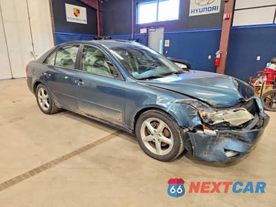 Czwarte zdjęcie samochodu z boku: 2006 HYUNDAI SONATA GLS V6 VIN:5NPEU46F36H008053 - miniatura