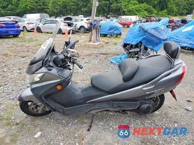 Trzecie zdjęcie samochodu z tyłu: 2006 SUZUKI AN400 K3 VIN:JS1CK43AX62102125 - miniatura