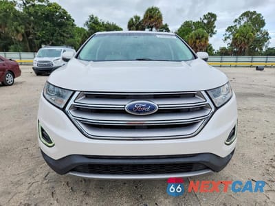 Piąte zdjęcie samochodu w środku: 2017 FORD EDGE TITANIUM VIN:2FMPK3K91HBC59513 - miniatura