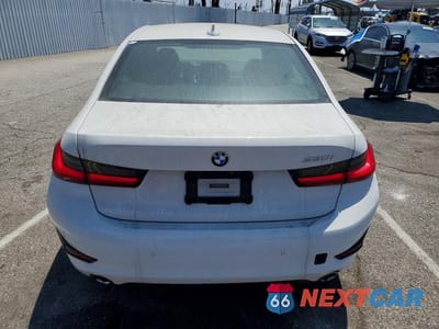 Zdjęcie 6 z 12 samochodu: 2020 BMW 330I VIN:3MW5R1J00L8B37009 - miniatura