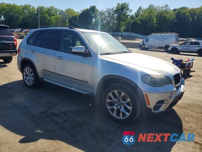 Czwarte zdjęcie samochodu z boku: 2011 BMW X5 XDRIVE35I VIN:5UXZV4C53BL741069 - miniatura