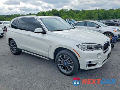 Czwarte zdjęcie samochodu z boku: 2017 BMW X5 XDR40E VIN:5UXKT0C32H0V95501 - miniatura
