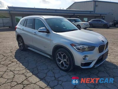 Czwarte zdjęcie samochodu z boku: 2017 BMW X1 SDRIVE28I VIN:WBXHU7C30H5H34986 - miniatura